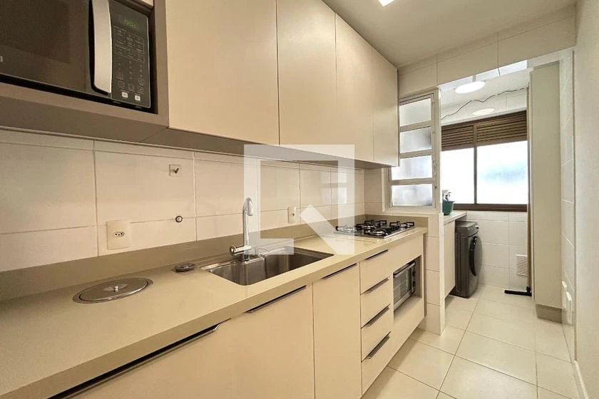 2-bedroom apartment in a building with a pool — photo 10