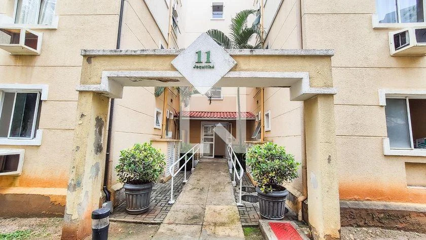 2-bedroom apartment in a building with a pool — photo 32