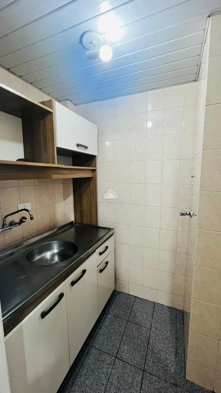 1-bedroom apartment with tiled floors throughout — photo 9