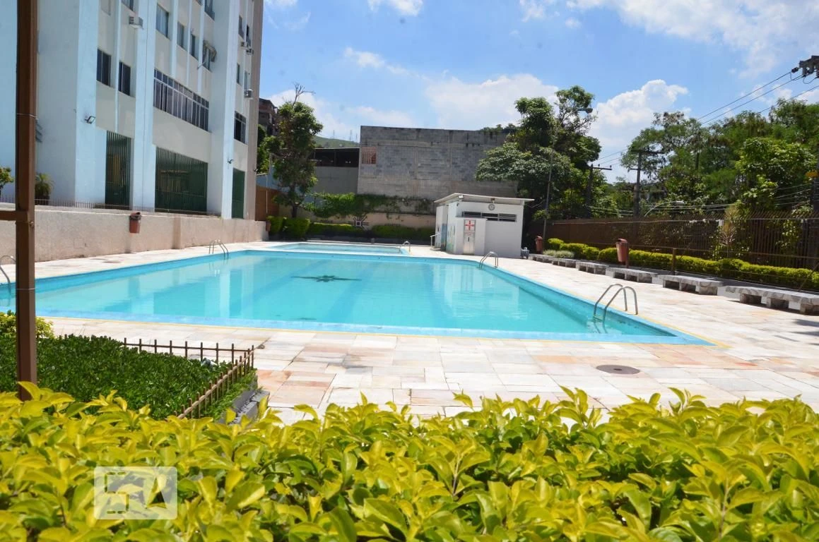 2-bedroom apartment in a building with a pool — photo 9