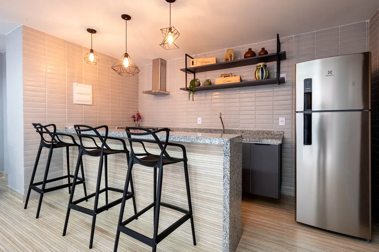 Apartamento de 38 m² com secadora e varanda envidraçada