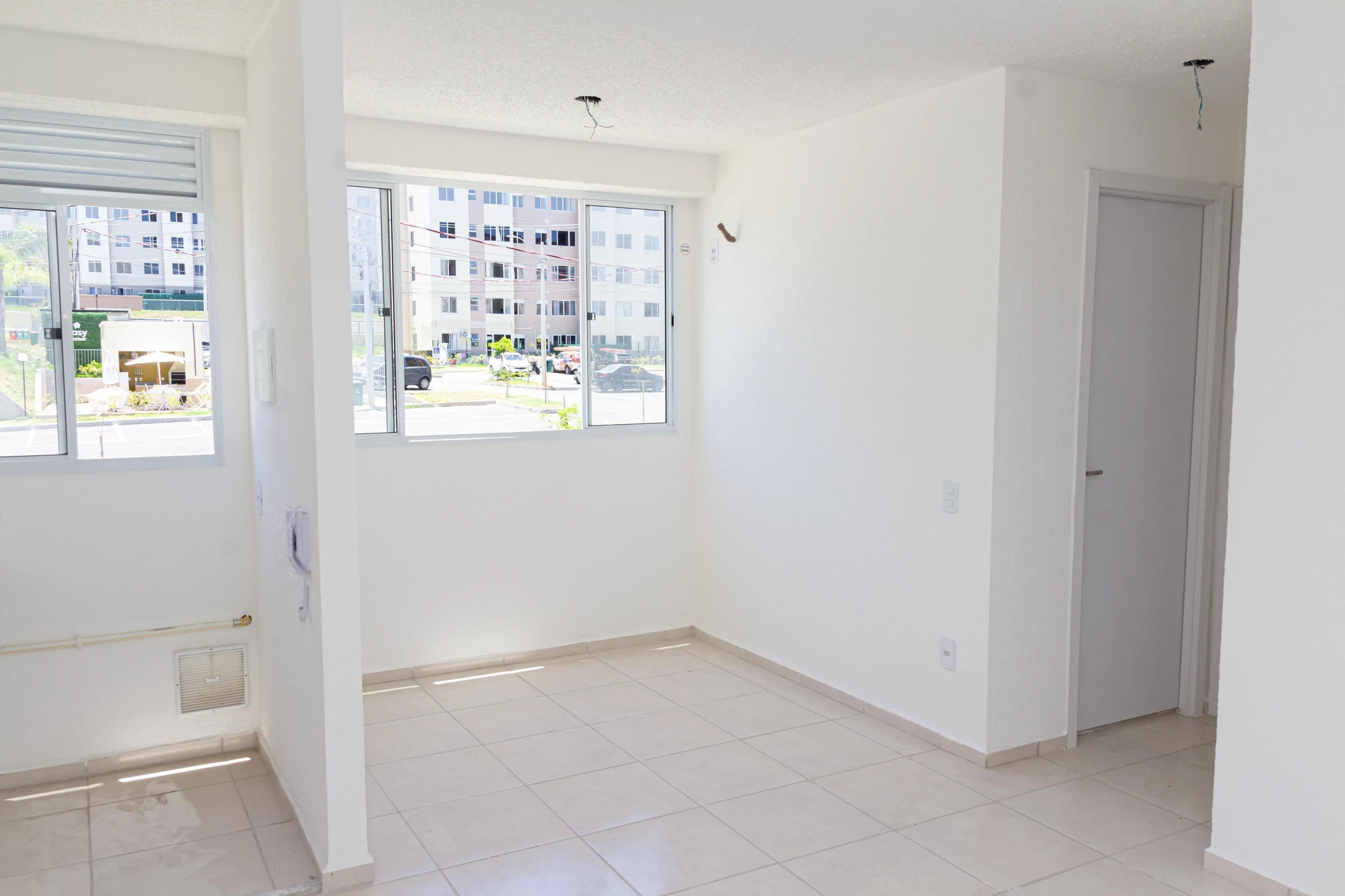 2-bedroom apartment in a building with a pool — photo 18