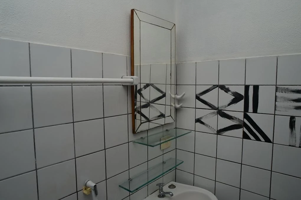 One-bedroom apartment in a building with a pool — photo 7