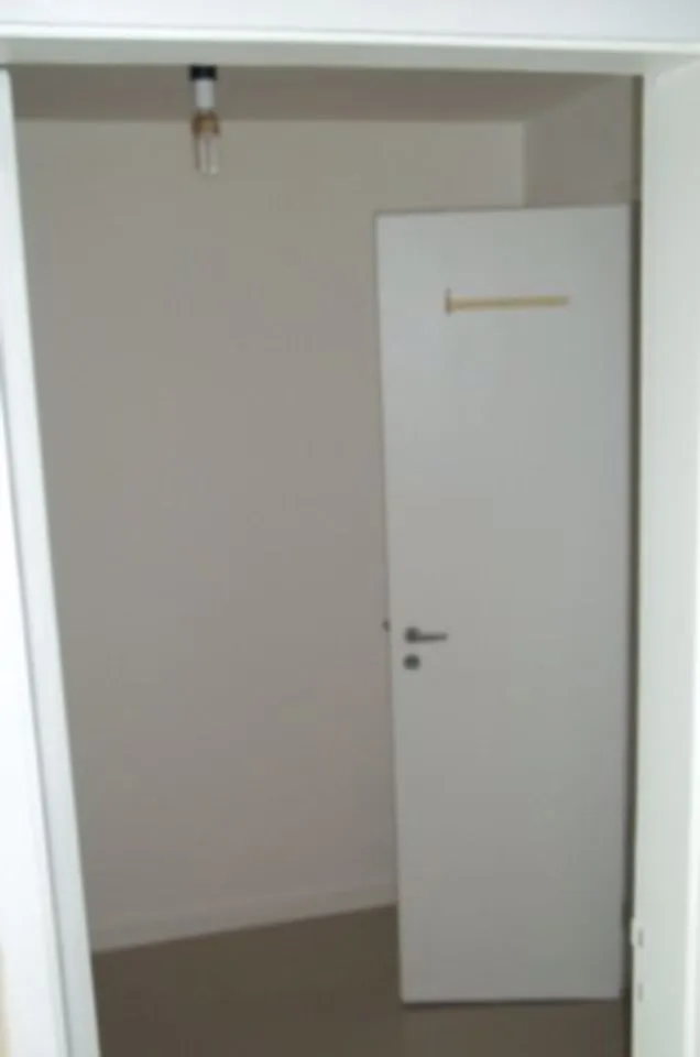 2-bedroom apartment in a building with a pool — photo 26