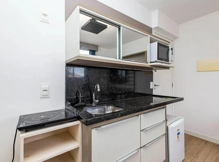 Студия 18 м² с 1 спальней и компактной кухней — photo 6