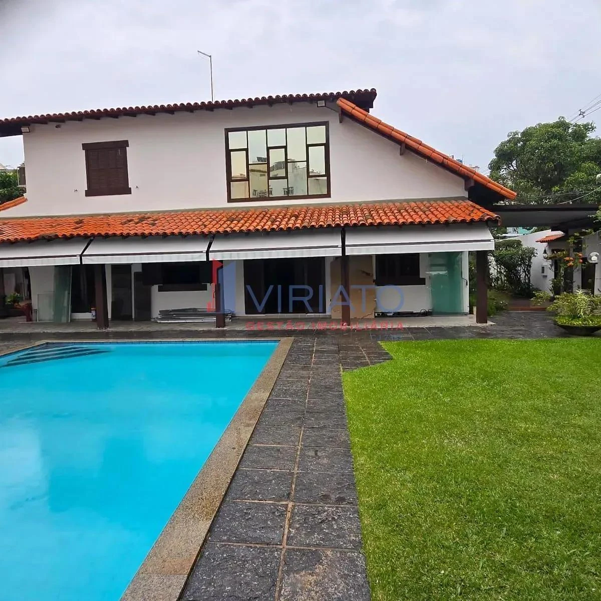 House with 4 bedrooms and a built-in balcony grill — photo 2