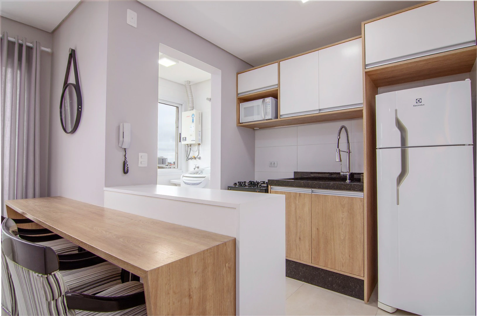 One-bedroom apartment with a washing machine in Curitiba — photo 2