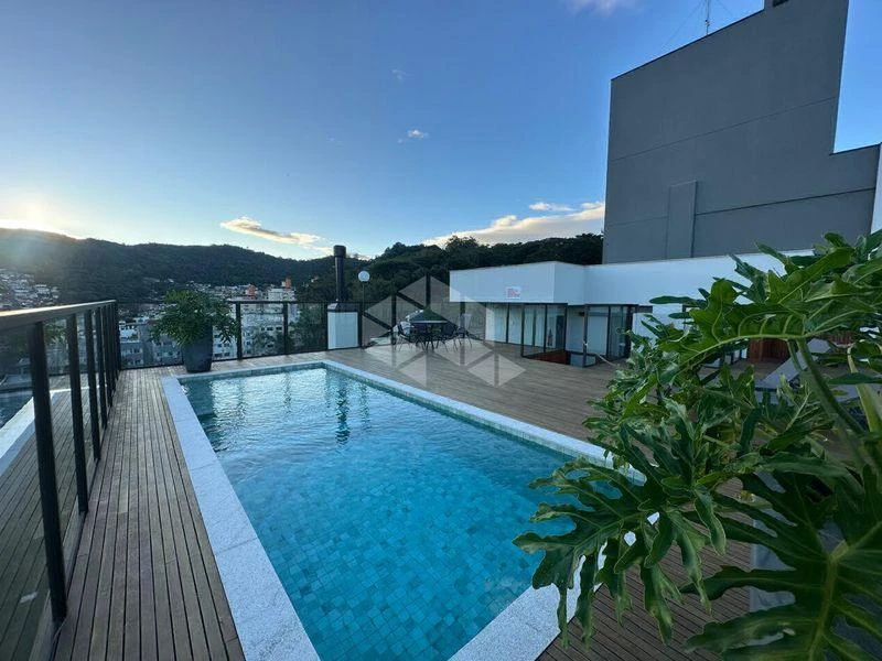 2-bedroom apartment in a building with a pool — photo 22
