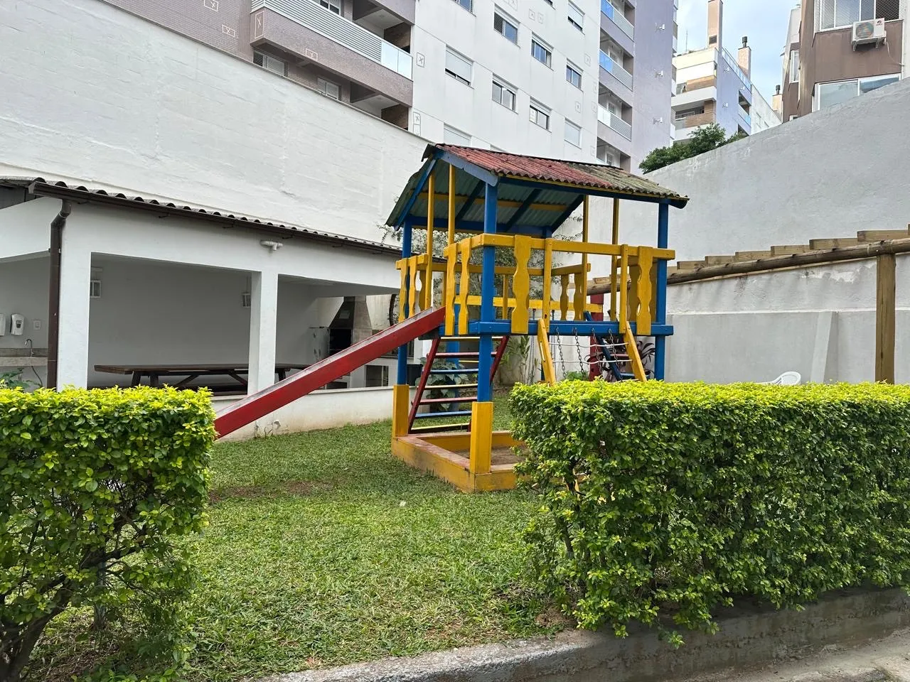 2-bedroom apartment in a building with a pool — photo 18