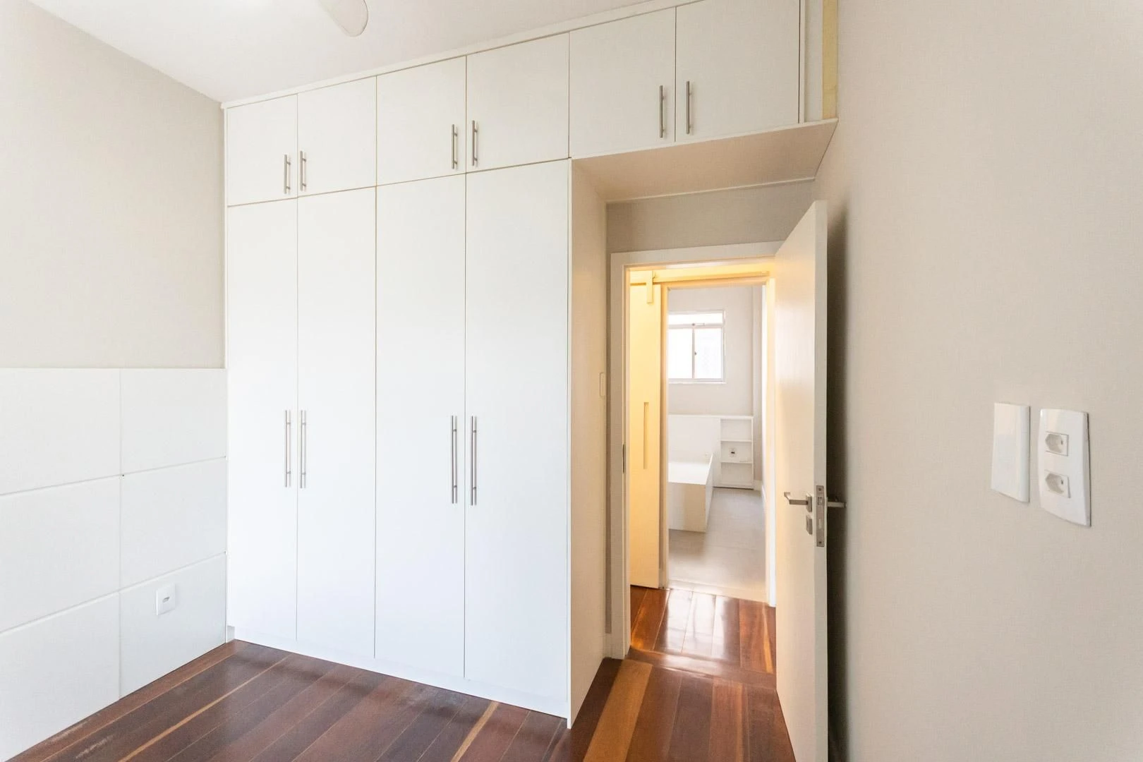 Wood or laminate floors in a 2-bedroom apartment, 64 m² — photo 15