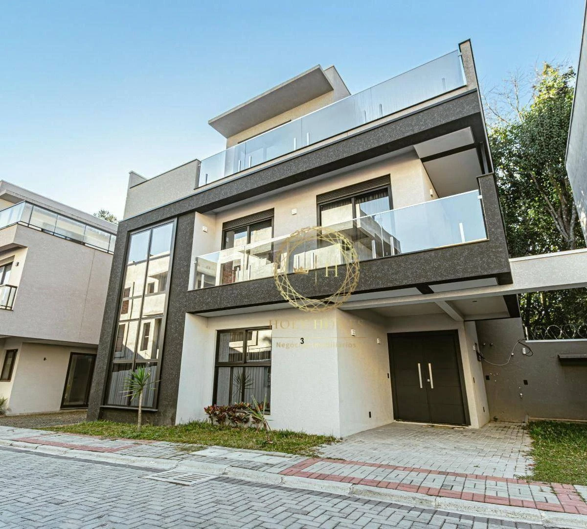 Condo house with a balcony and open-plan kitchen