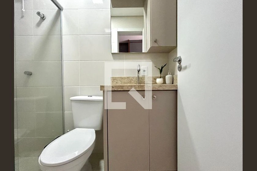 Kitnet mobiliada para aluguel com cozinha compacta — photo 12