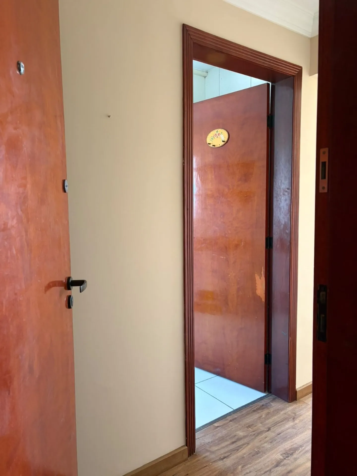 Wood or laminate floors in a 3-bedroom apartment, 65 m² — photo 10