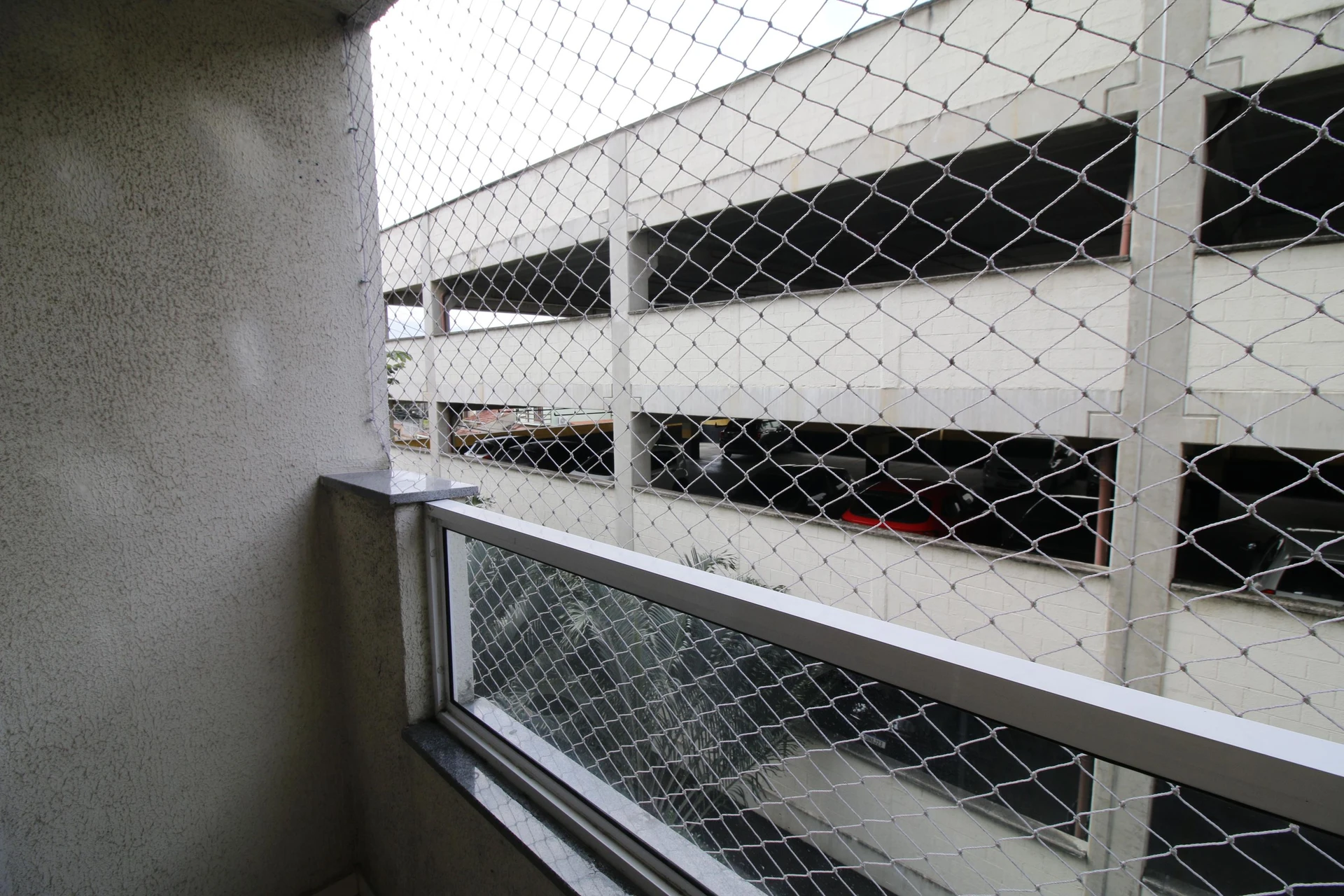 2-bedroom apartment in a building with a pool — photo 15
