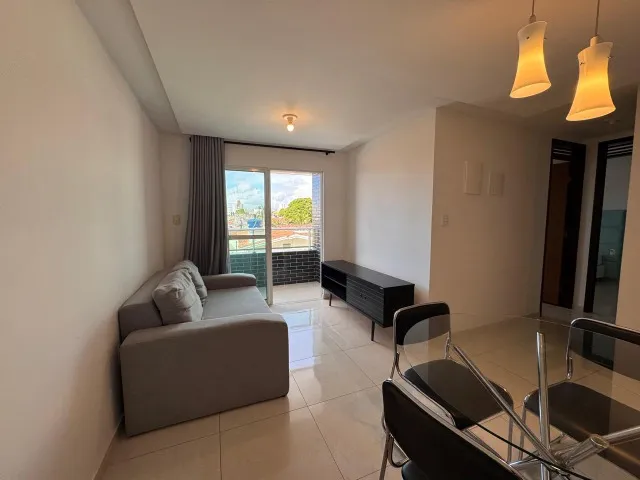 2-bedroom apartment in a building with a pool