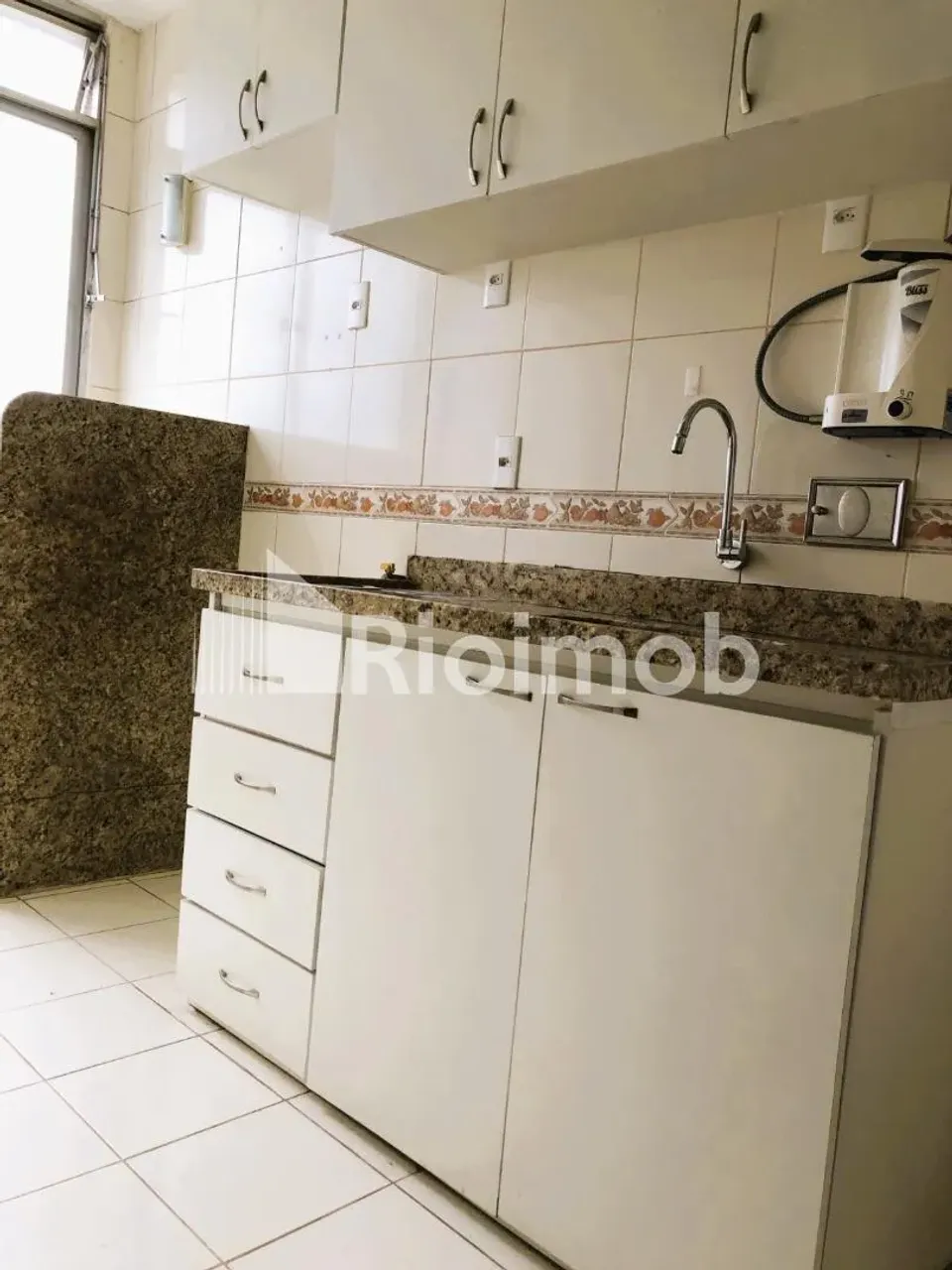 2-bedroom apartment in a building with a pool — photo 12