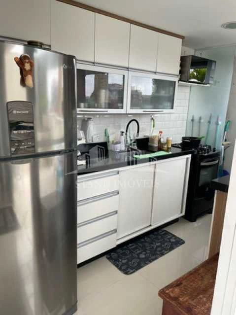 Balcony with a grill in a 2-bedroom apartment, 140 m² — photo 20