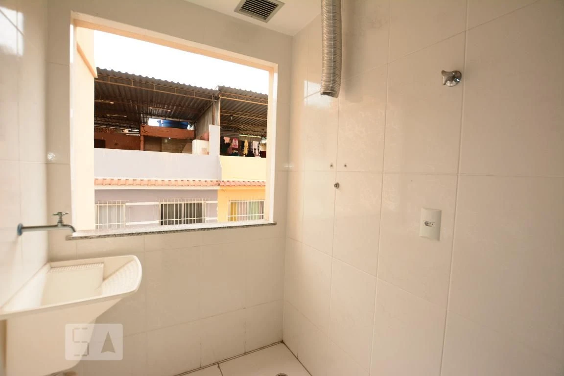 2-bedroom apartment with balcony sink and utility area — photo 7