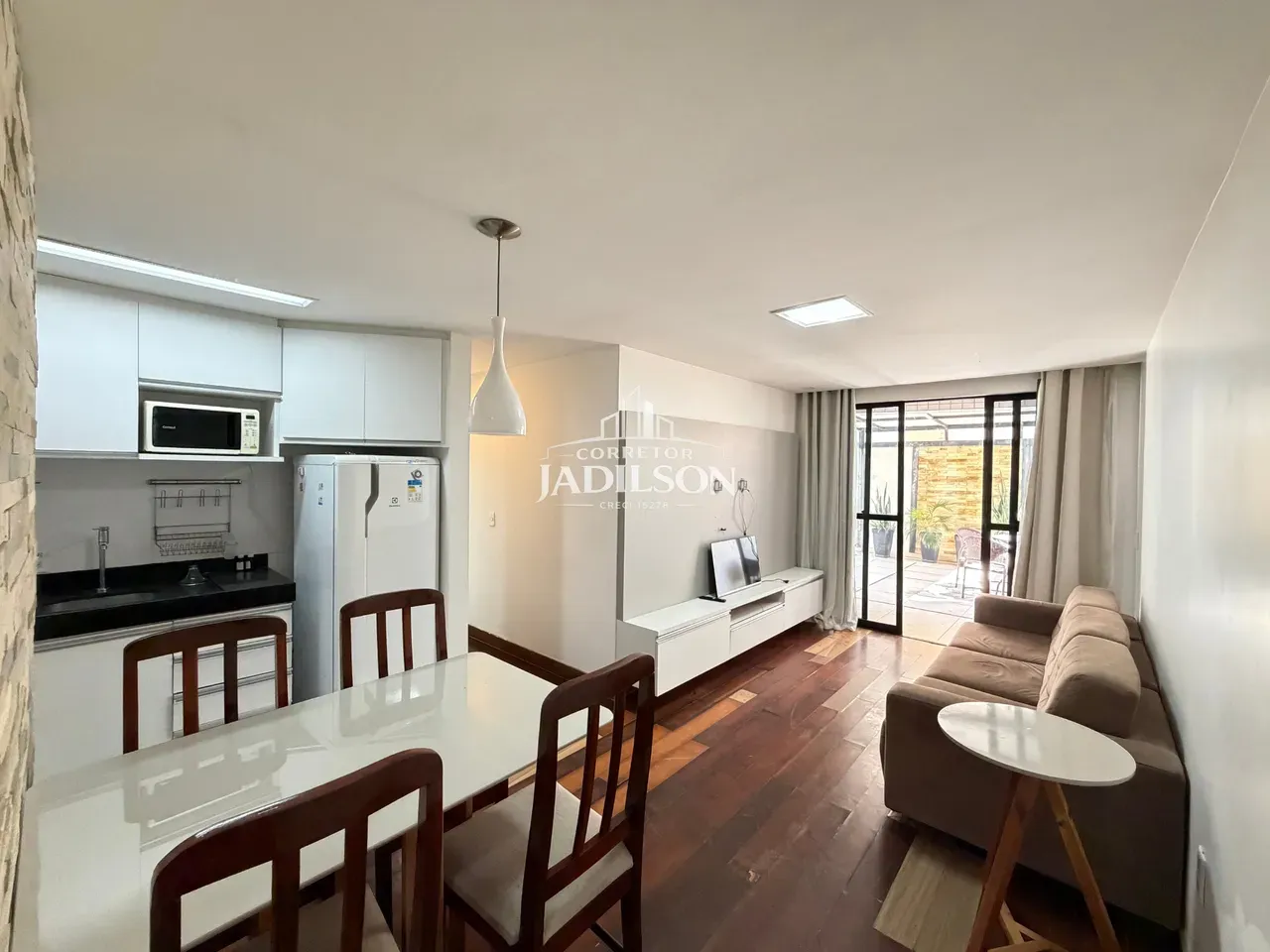 2-bedroom apartment in a building with a pool