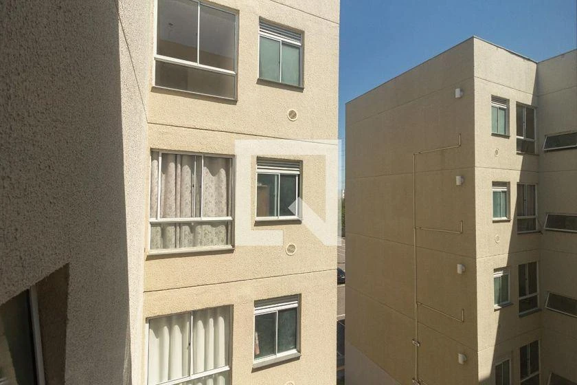 2-bedroom apartment in a building with a pool — photo 12