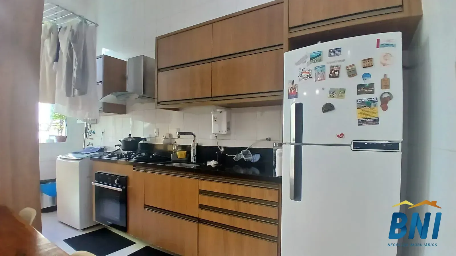 Apartamento de 2 quartos com cozinha integrada e varanda — photo 22