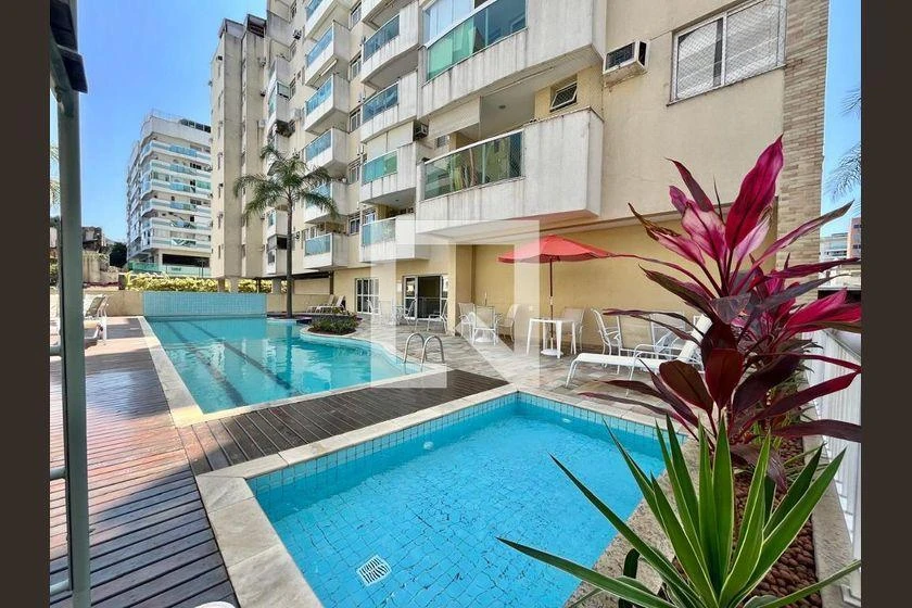 2-bedroom apartment in a building with a pool — photo 41