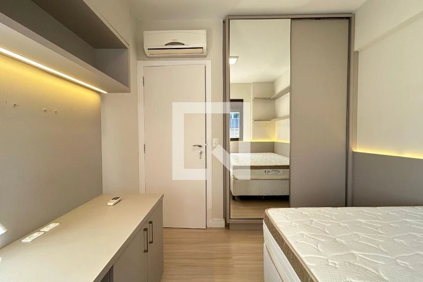 2-bedroom apartment in a building with a pool — photo 18