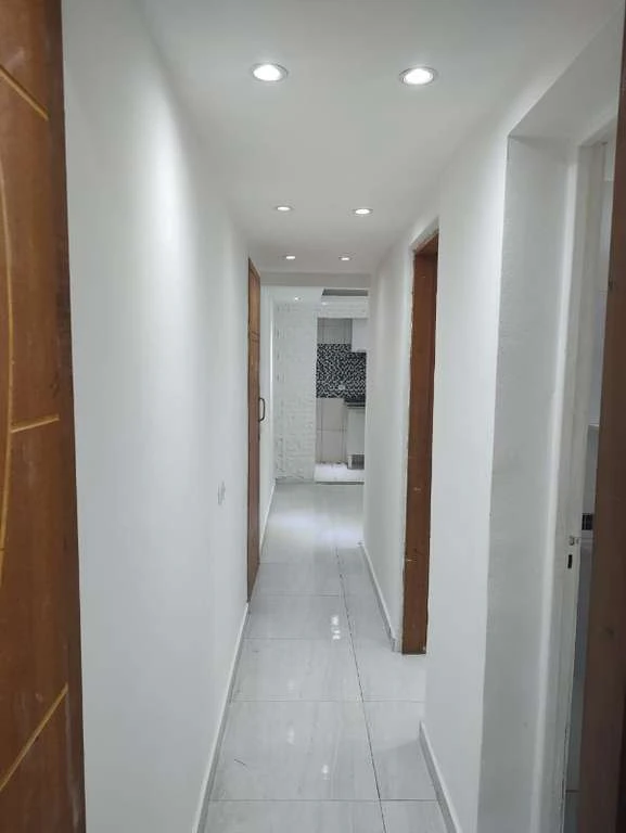 Apartamento de 2 quartos com cozinha fechada e 63 m² — photo 17