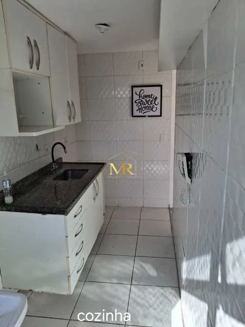 2-bedroom apartment in a building with a pool — photo 2