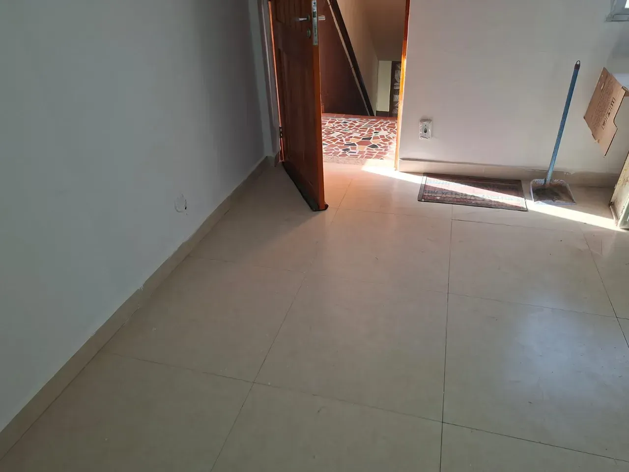1-bedroom apartment with tiled floors and glass shower — photo 16