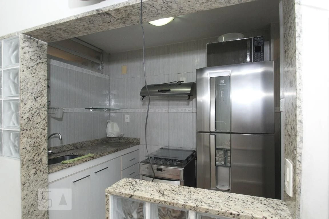 Furnished studio with 1 bedroom and glass shower enclosure — photo 9