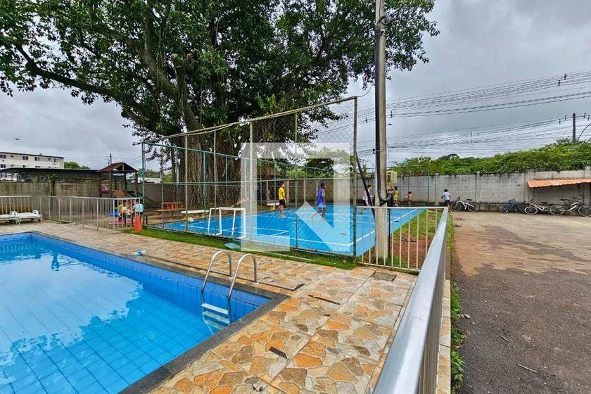 2-bedroom apartment in a building with a pool — photo 7