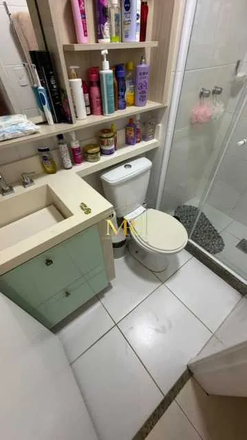 2-bedroom apartment in a building with a pool — photo 14