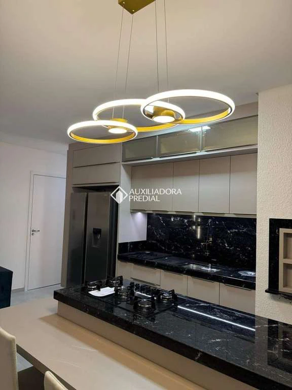 Apartamento de 2 dormitorios con cocina abierta y fogón a gas