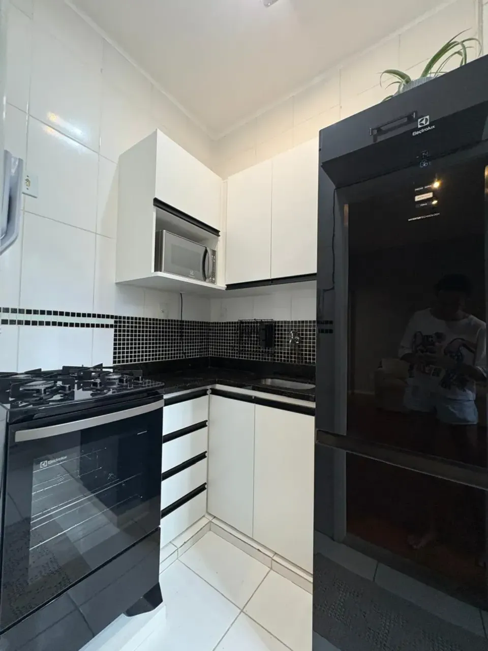 One-bedroom apartment with a washing machine — photo 18