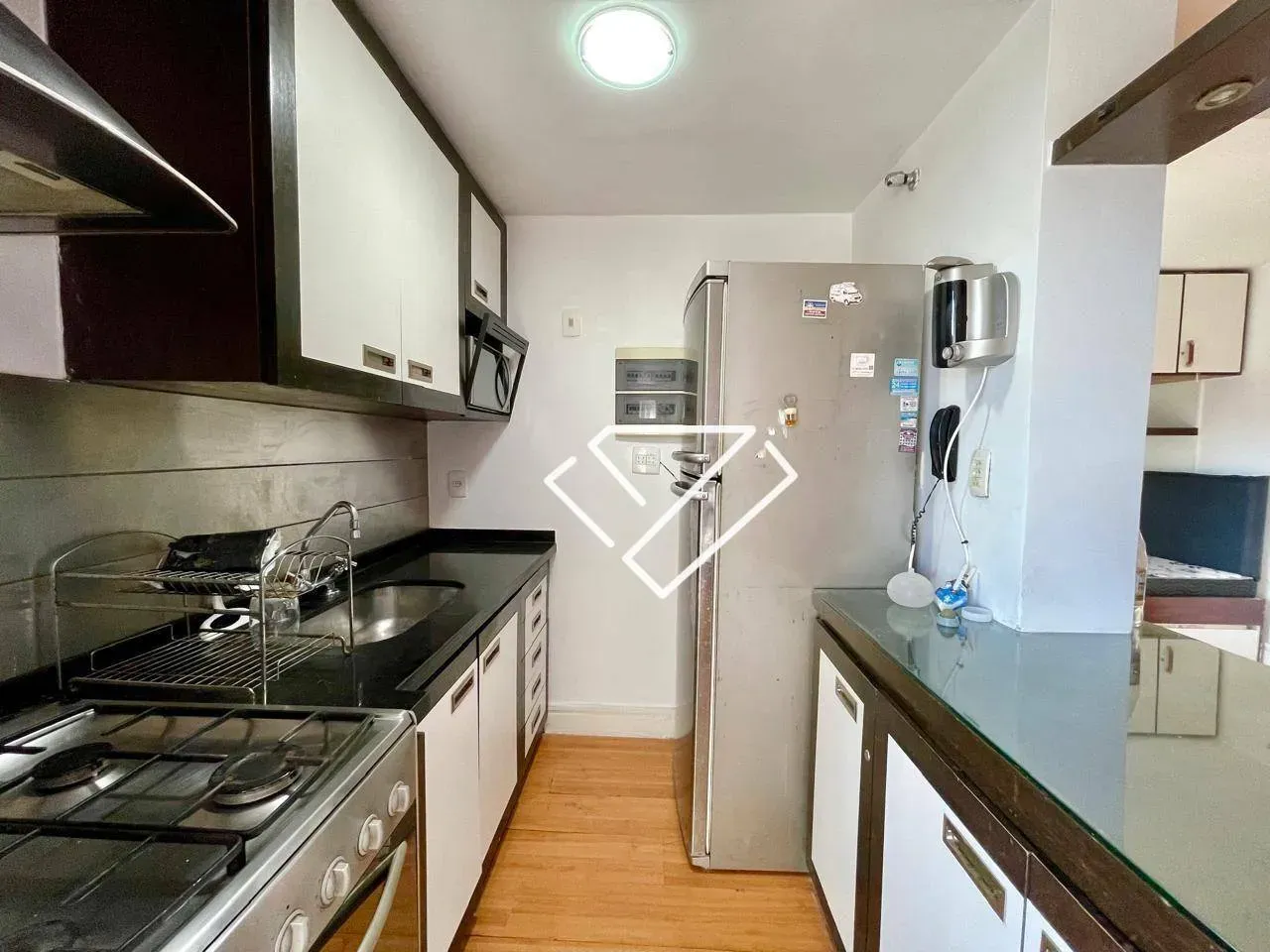 2-bedroom apartment with open-plan kitchen and balcony — photo 27