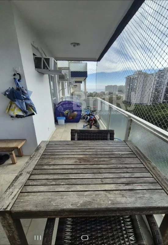 2-bedroom apartment in a building with a pool — photo 17