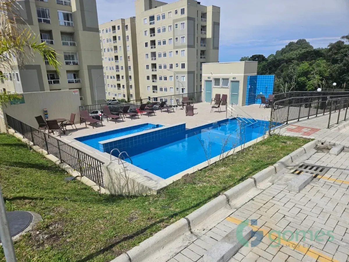 2-bedroom apartment in a building with a pool — photo 6