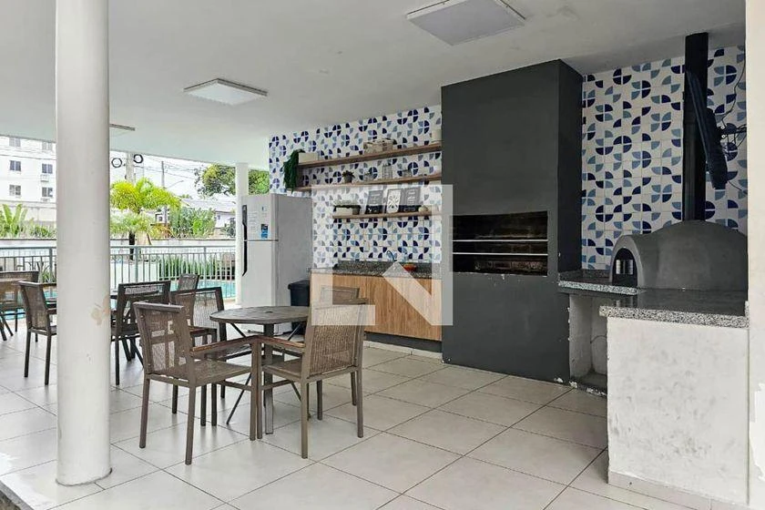 2-bedroom apartment in a building with a pool — photo 2