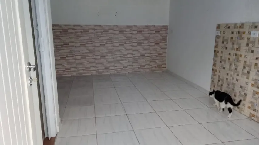 Estúdio sem mobília com cozinha aberta a gás e área de lavanderia — photo 5