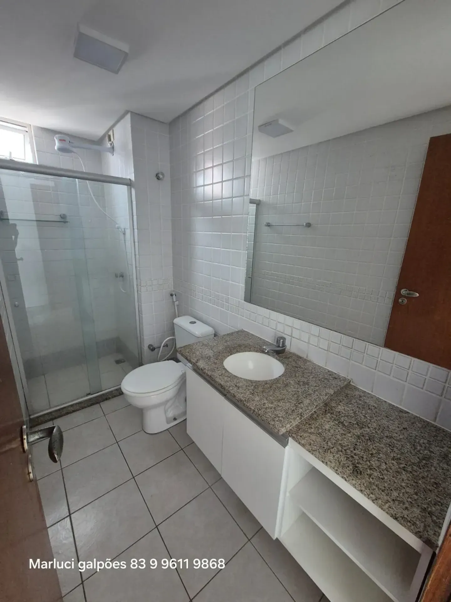 2-bedroom apartment in a building with a pool — photo 14