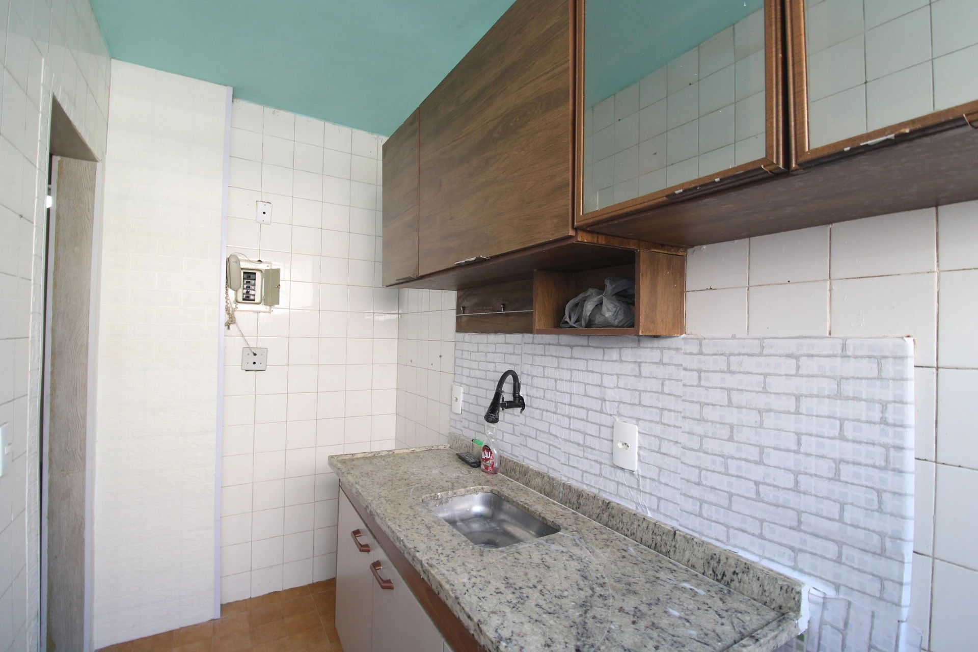 2-bedroom apartment in a building with a pool — photo 12