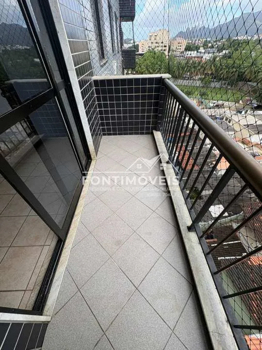 2-bedroom apartment in a building with a pool — photo 9