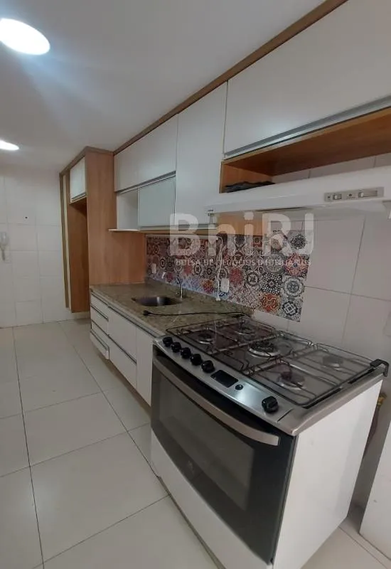 3-bedroom apartment in a building with a pool — photo 9