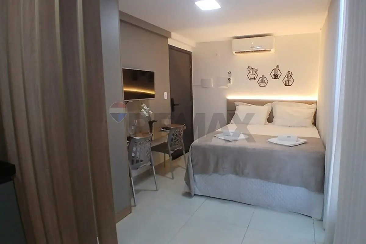 One-bedroom apartment in a building with a pool — photo 7