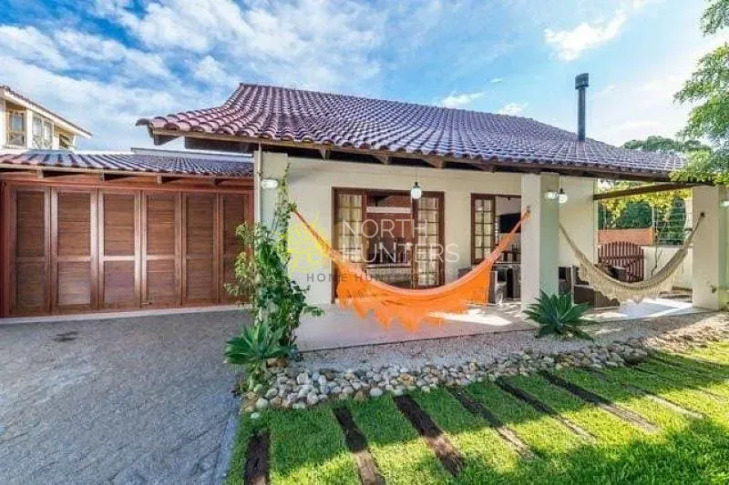 Casa com 4 dormitórios, 2 suítes e churrasqueira na varanda — photo 14