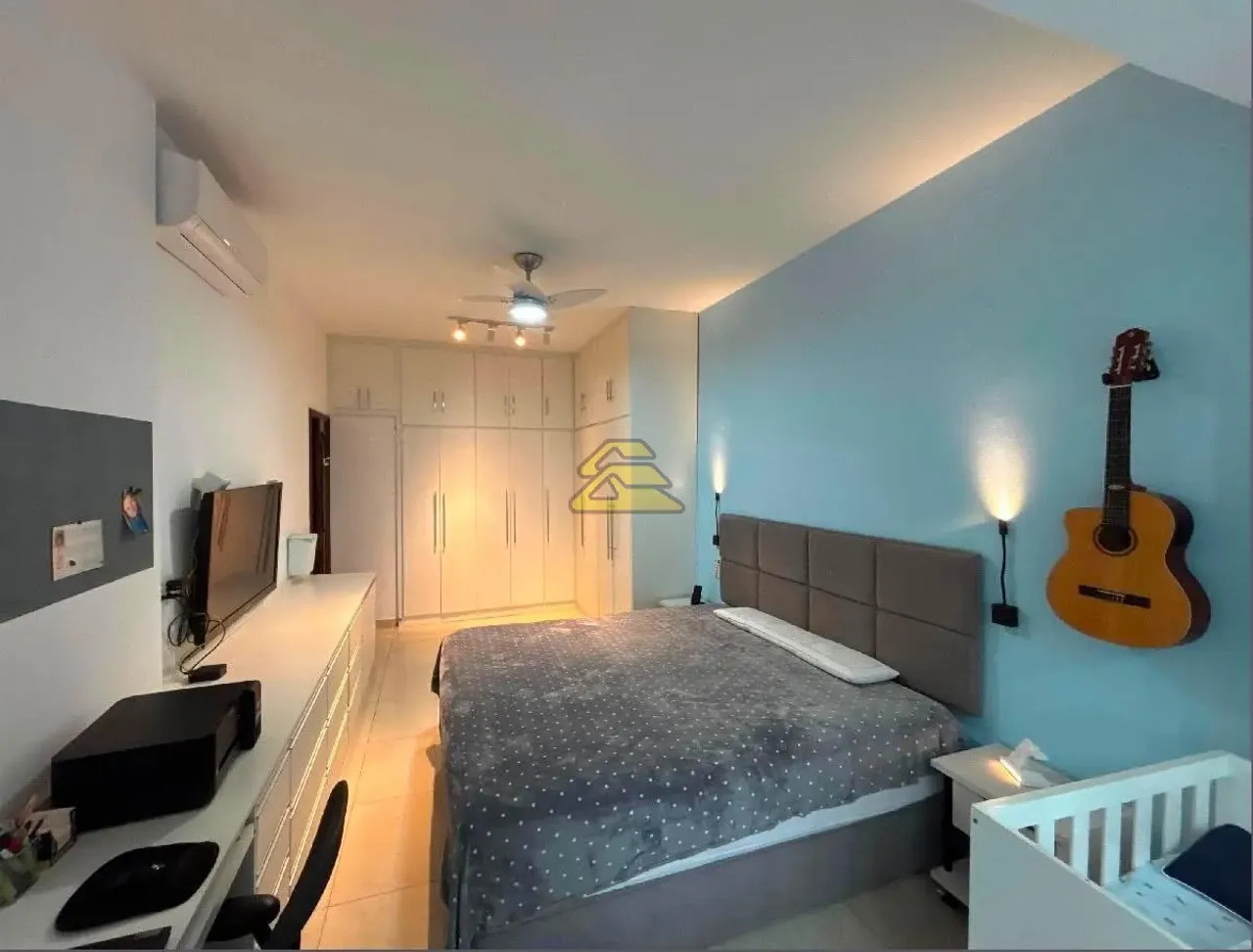 3-bedroom apartment with wall TV unit and tile floors — photo 10