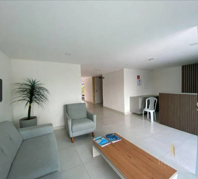 2-bedroom apartment in a building with a pool — photo 14