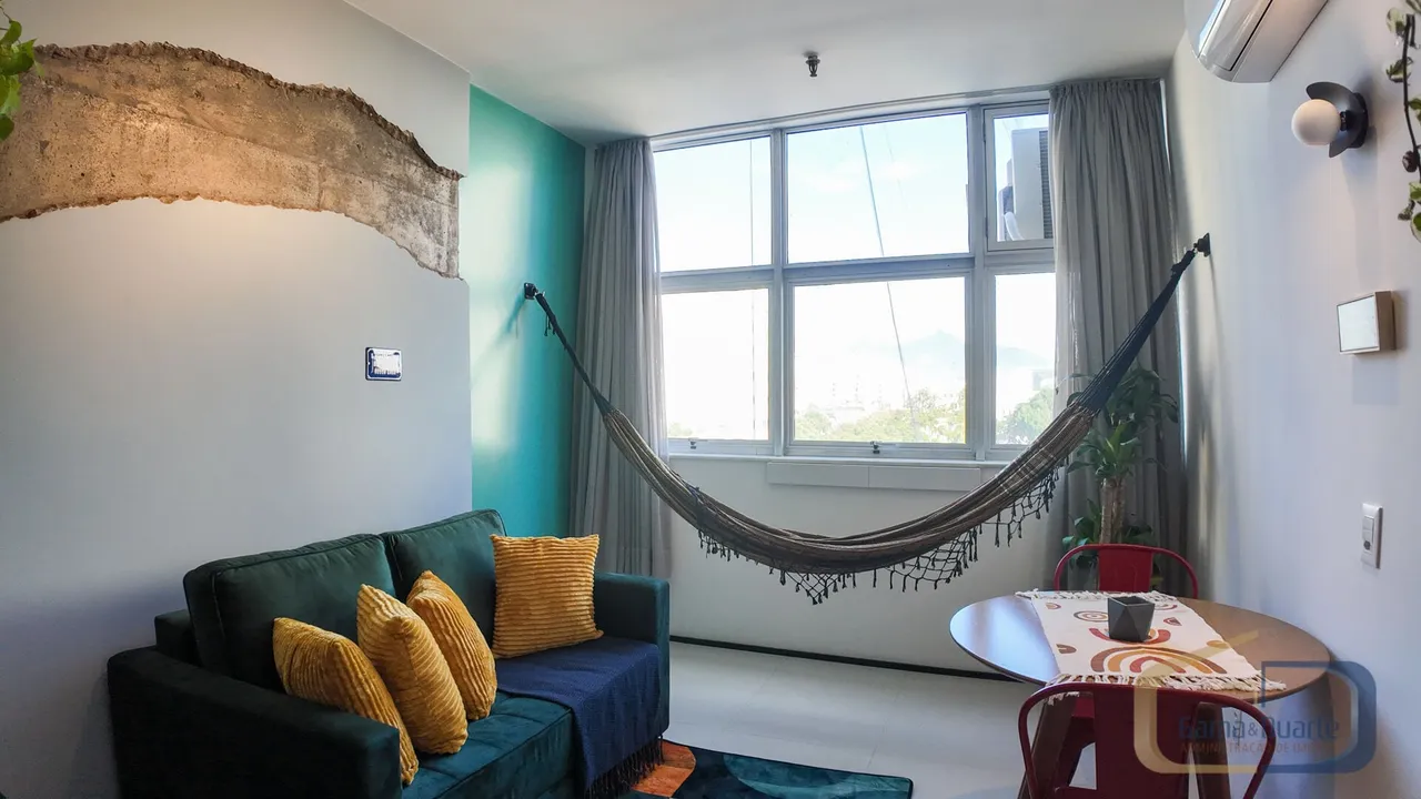 Furnished apartment with open-plan kitchen and glass shower — photo 7