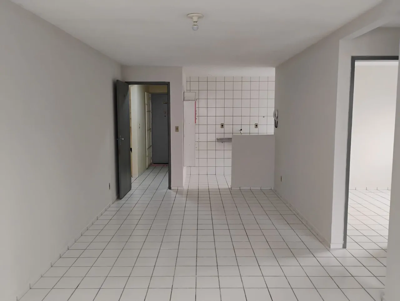 Apartment with fitted kitchen cabinets and laundry area — photo 4
